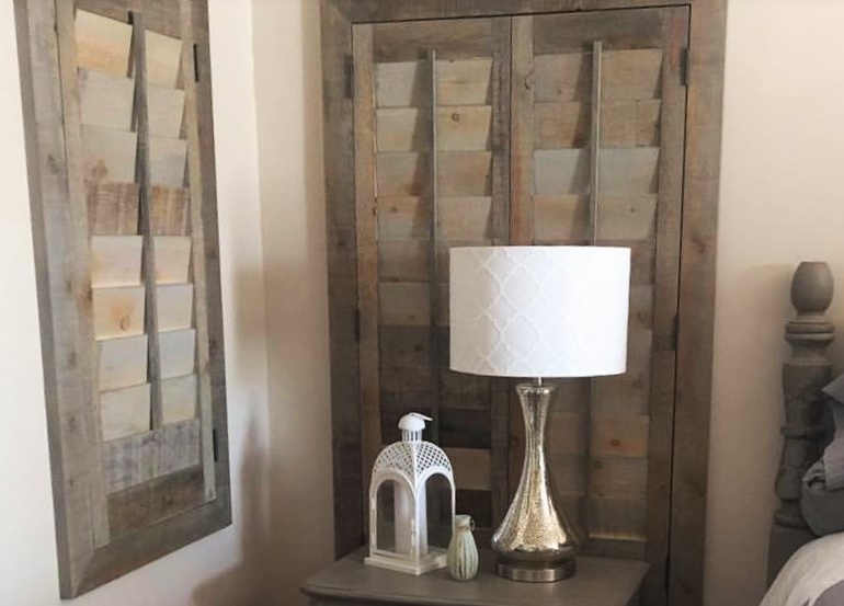 Hartford bedroom with recycled wood shutters.